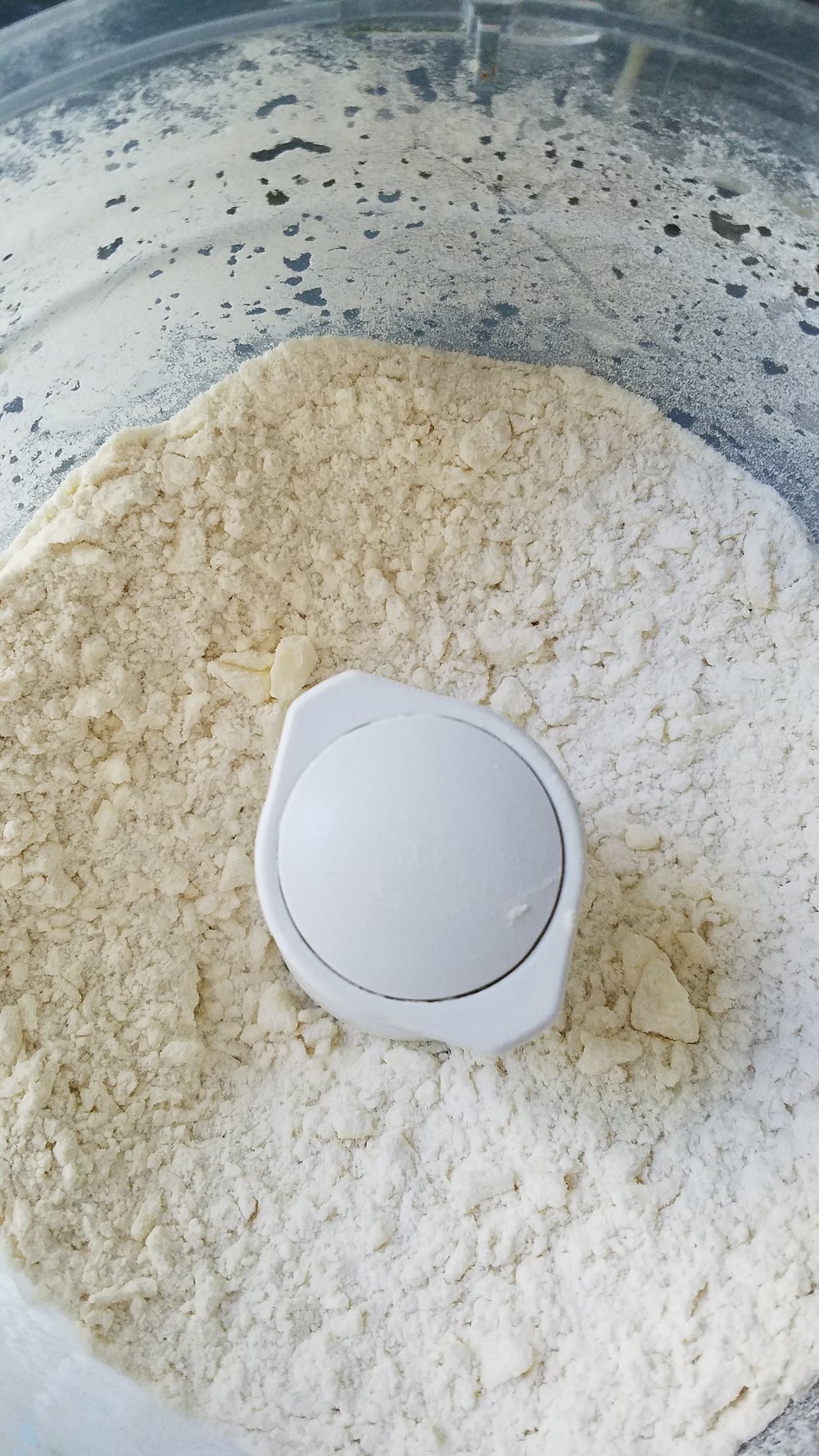 At this point your pastry dough should look like coarse meal
