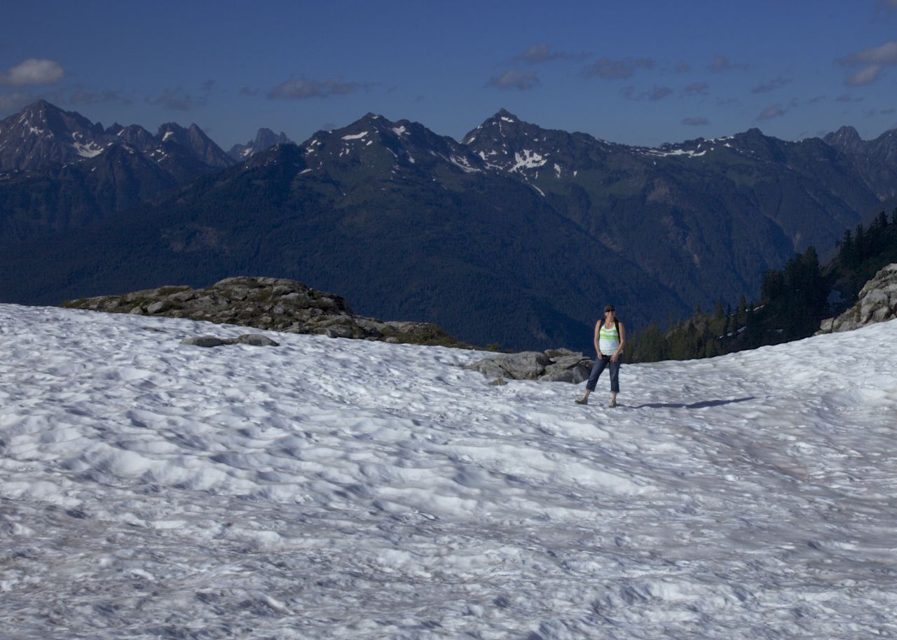 Justine hiking on the snow field.