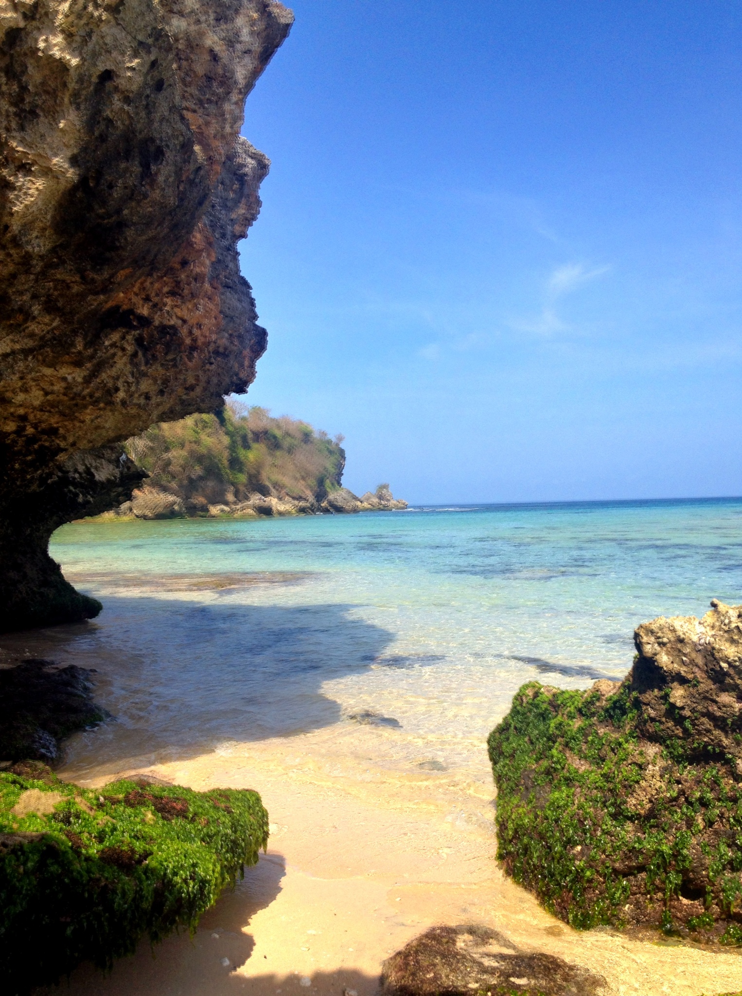 The water and sand were beautiful on this little beach. It was still rocky once you got out, but if you were there at high tide, it would not have been an issue.