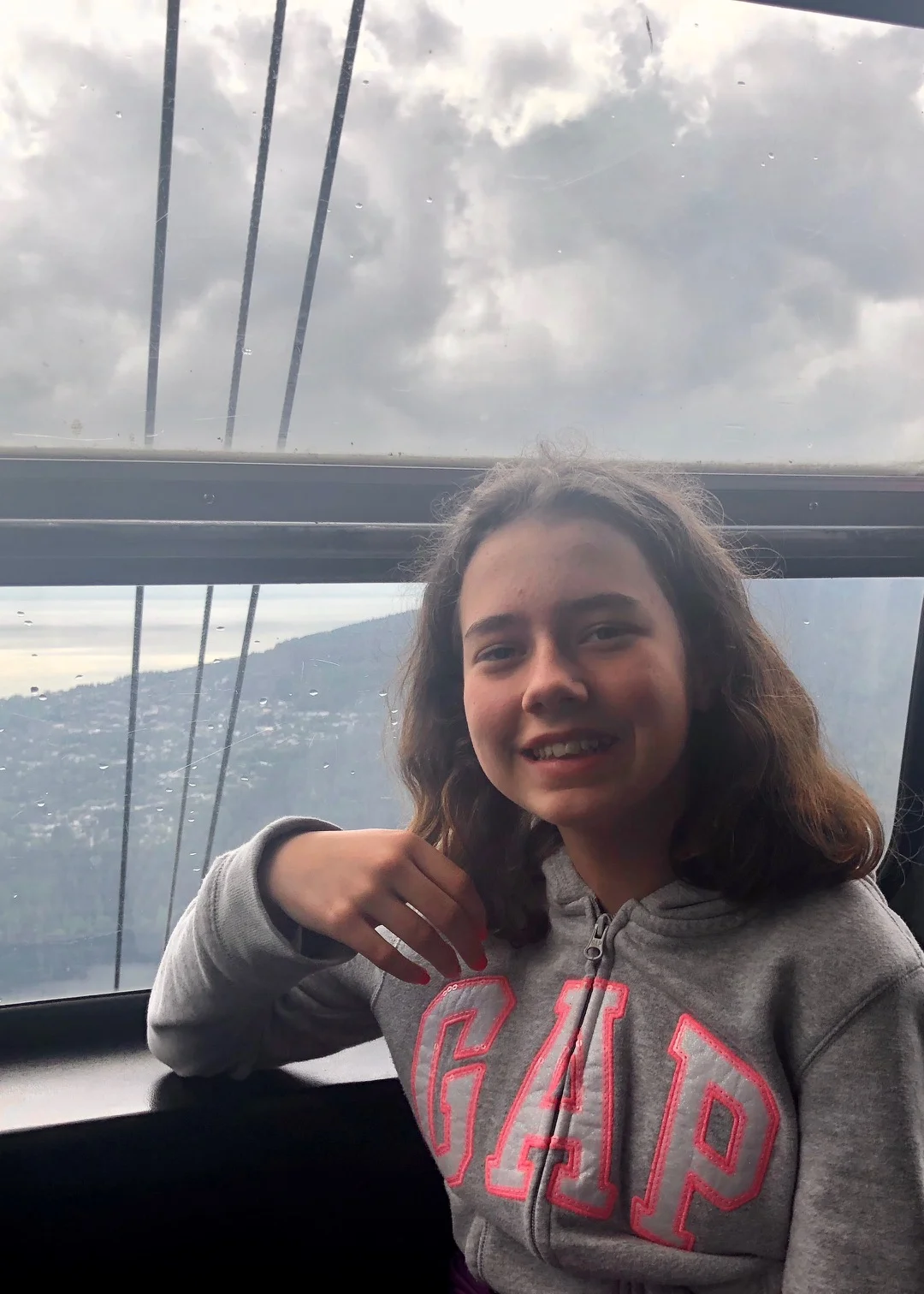 Heading up the gondola to the top of Grouse Mountain!