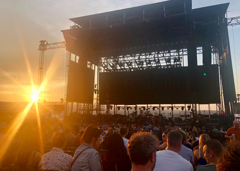  As the sun went down, the opening act came on stage 