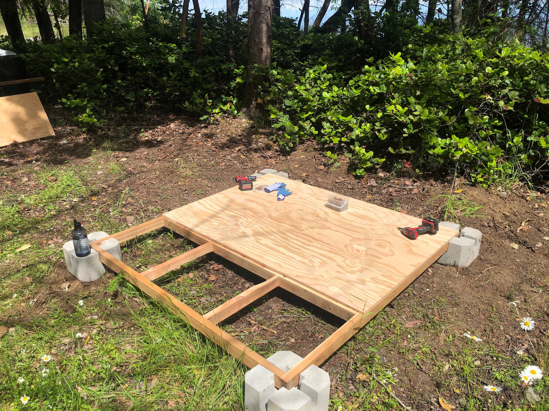  The first task was leveling and assembling the floor. We had that done by just after lunch. Getting it square and level was a bit of a pain. 