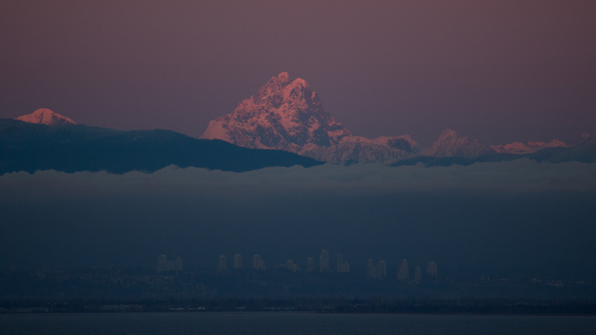  That huge mountain is a long way east of Vancouver. 