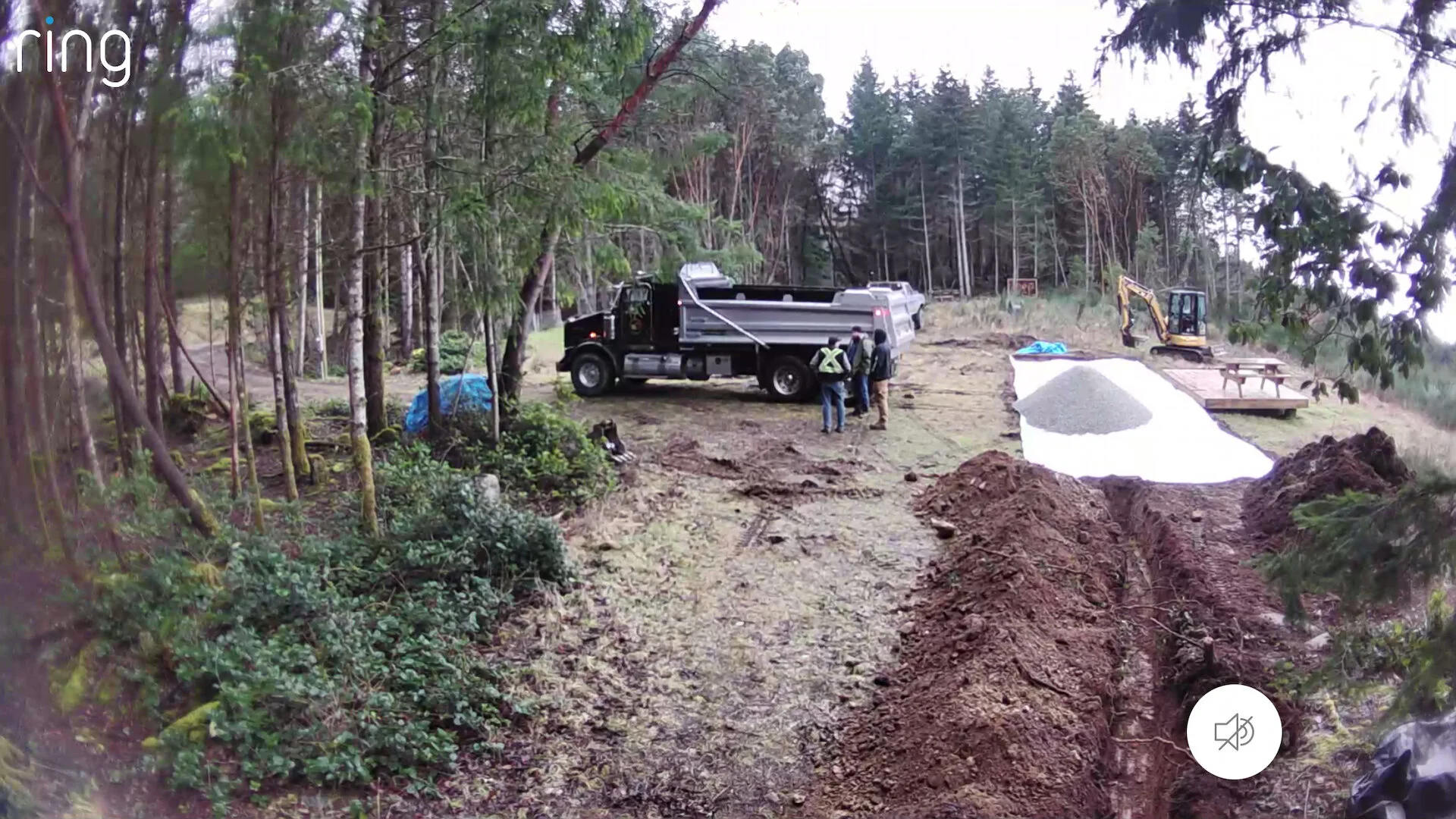  To prep the site for delivery, we had to do a bunch of work. First they flattened an area a little bit bigger than the unit, put down poly and covered it with granvel to provide a solid base. 