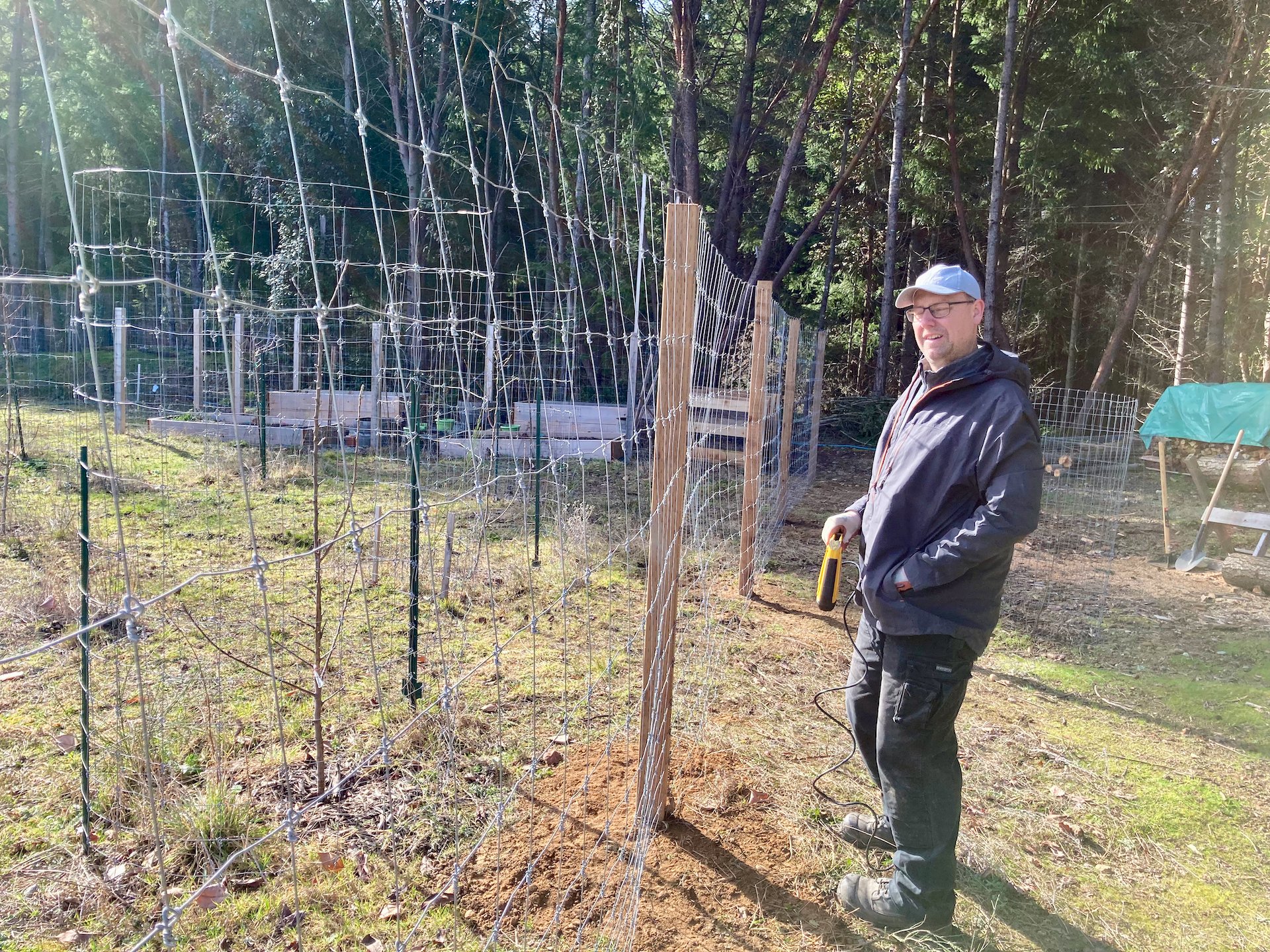  Putting up the fence. 