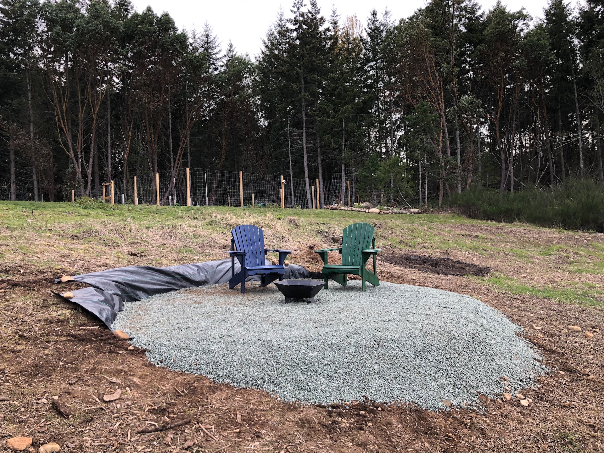  Landscape fabric and a load of crushed gravel really improved the look of it. 