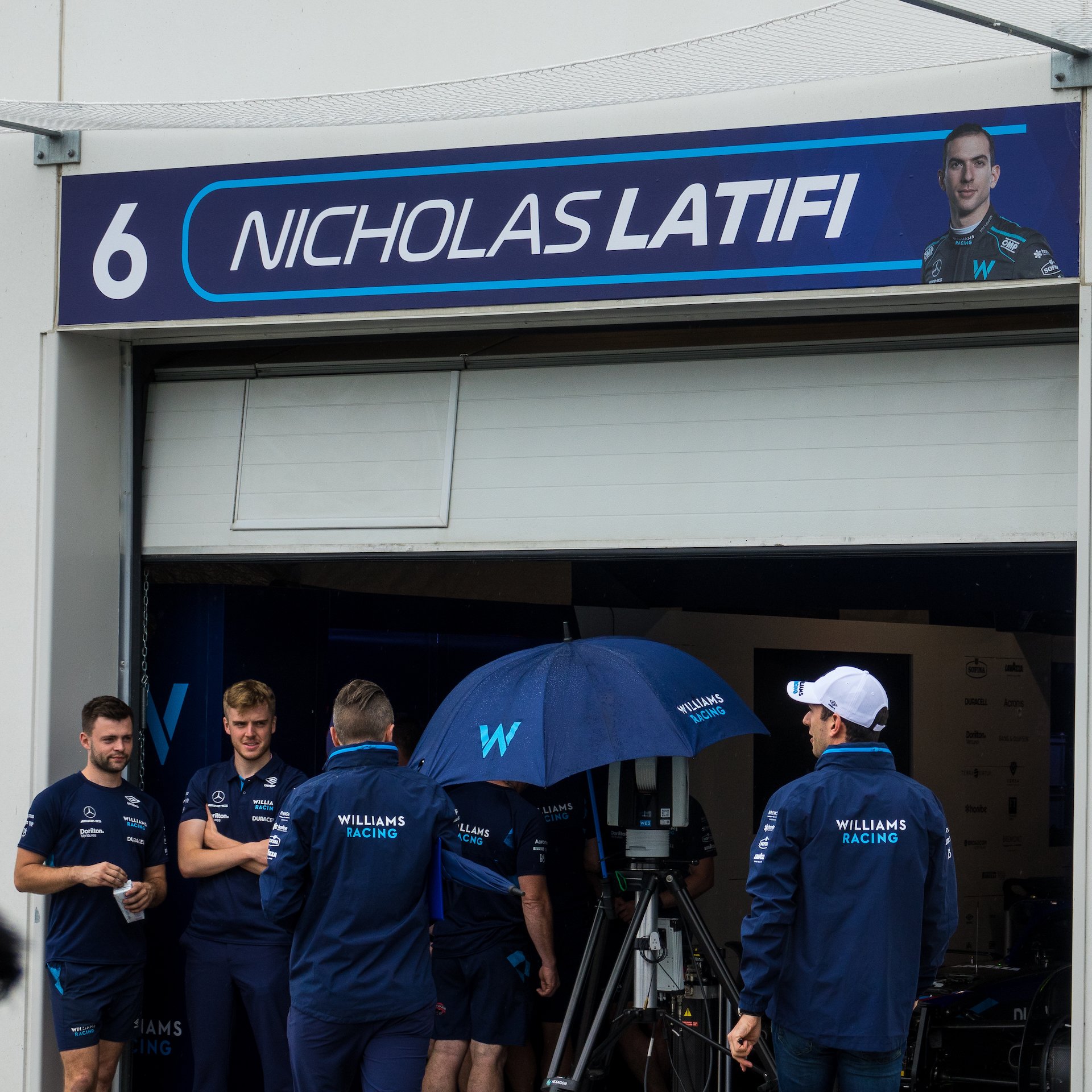  Nicholas Latifi (white hat on the right), heading into the Williams garage. One of the two Canadian drivers on the grid.  