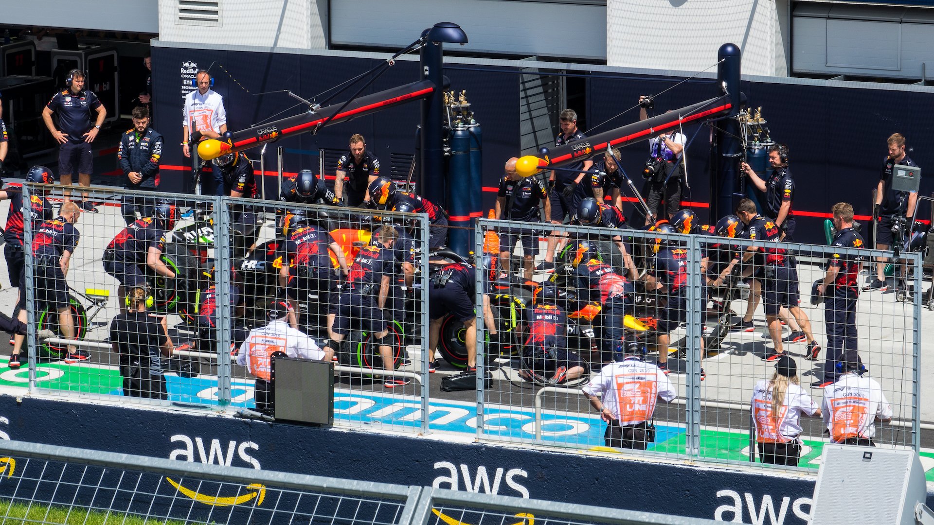  The Red Bull team active in the pits. 