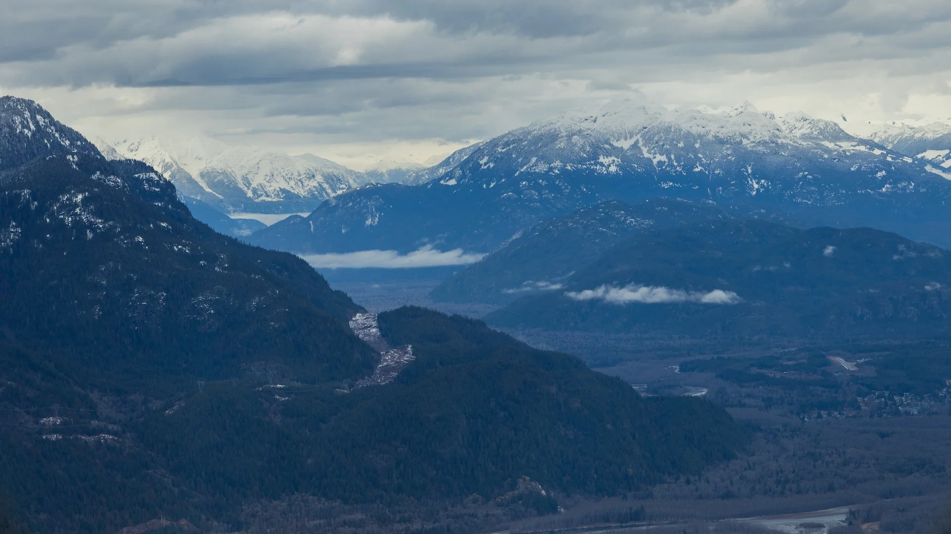 The clouds were lying low over the valleys off in the distance.