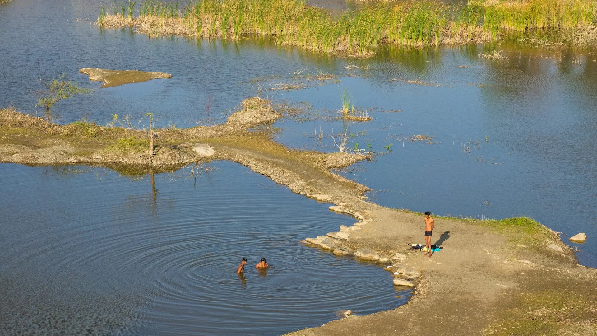  The lack of water wasn’t stopping a few of the local kids from cooling off. 