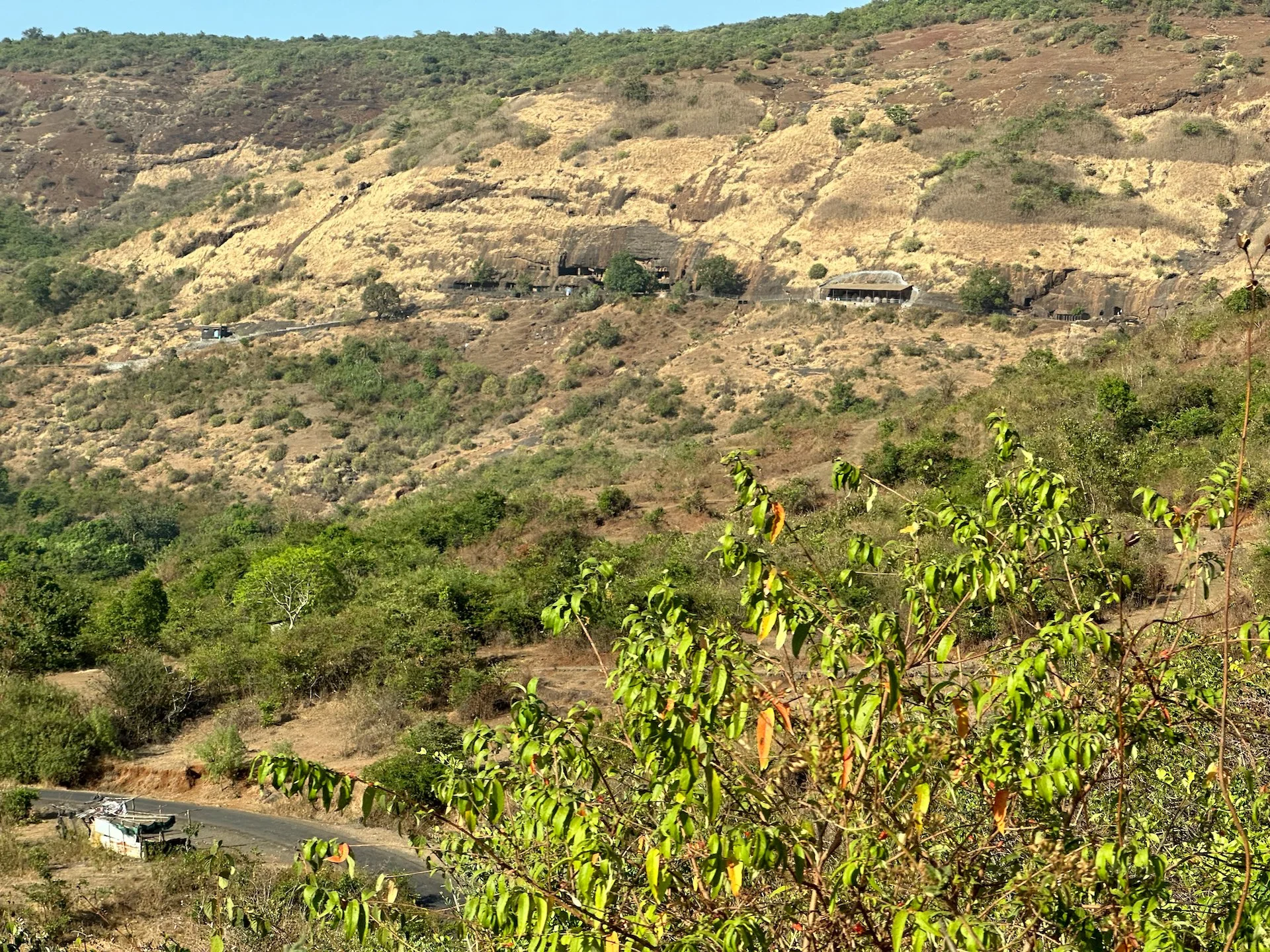  On the crazy drive back down from the fort, there were views back over to the cave complex we visited in the morning.  
