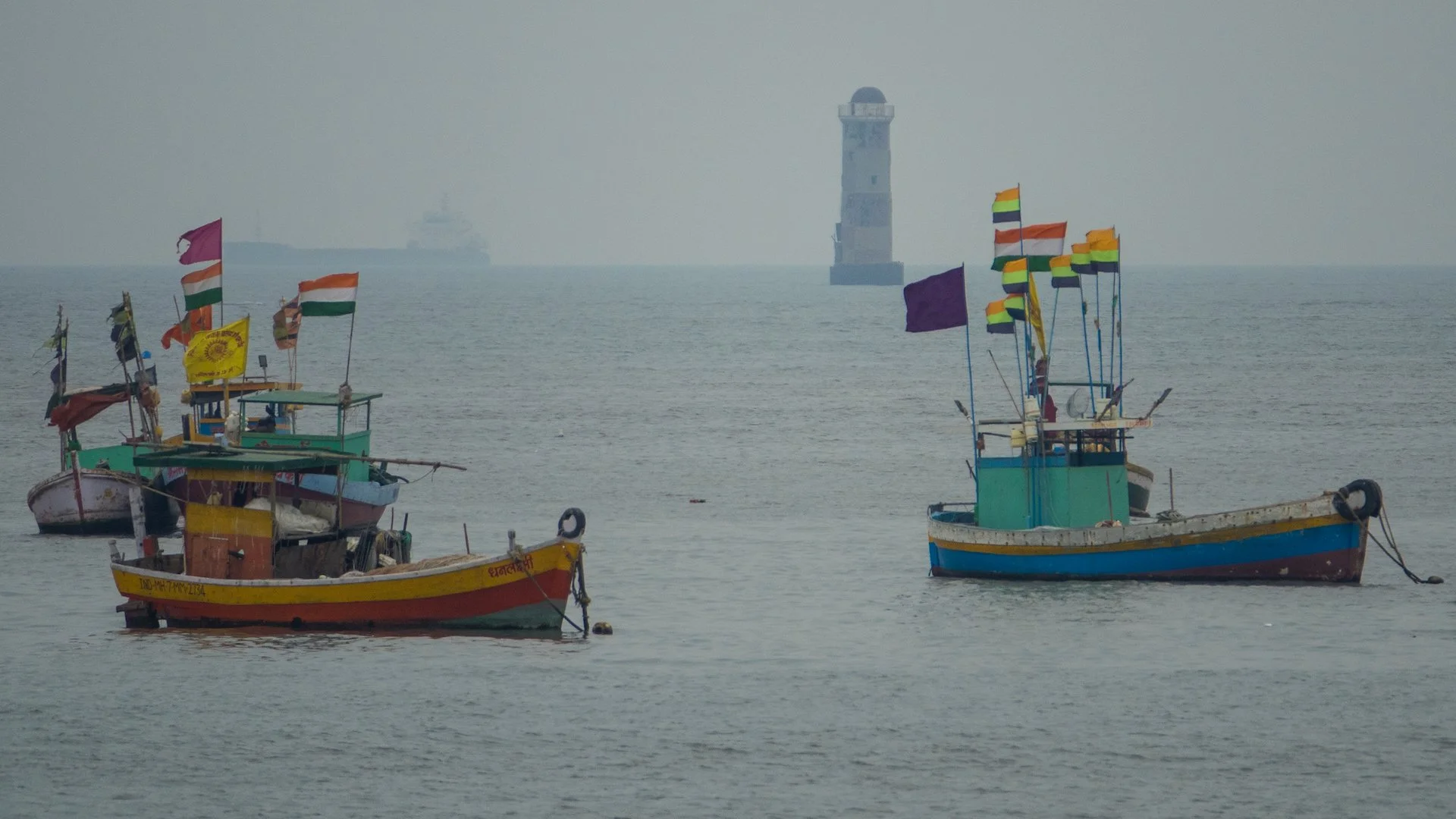  Some small, colorful boats with lots of flags! 