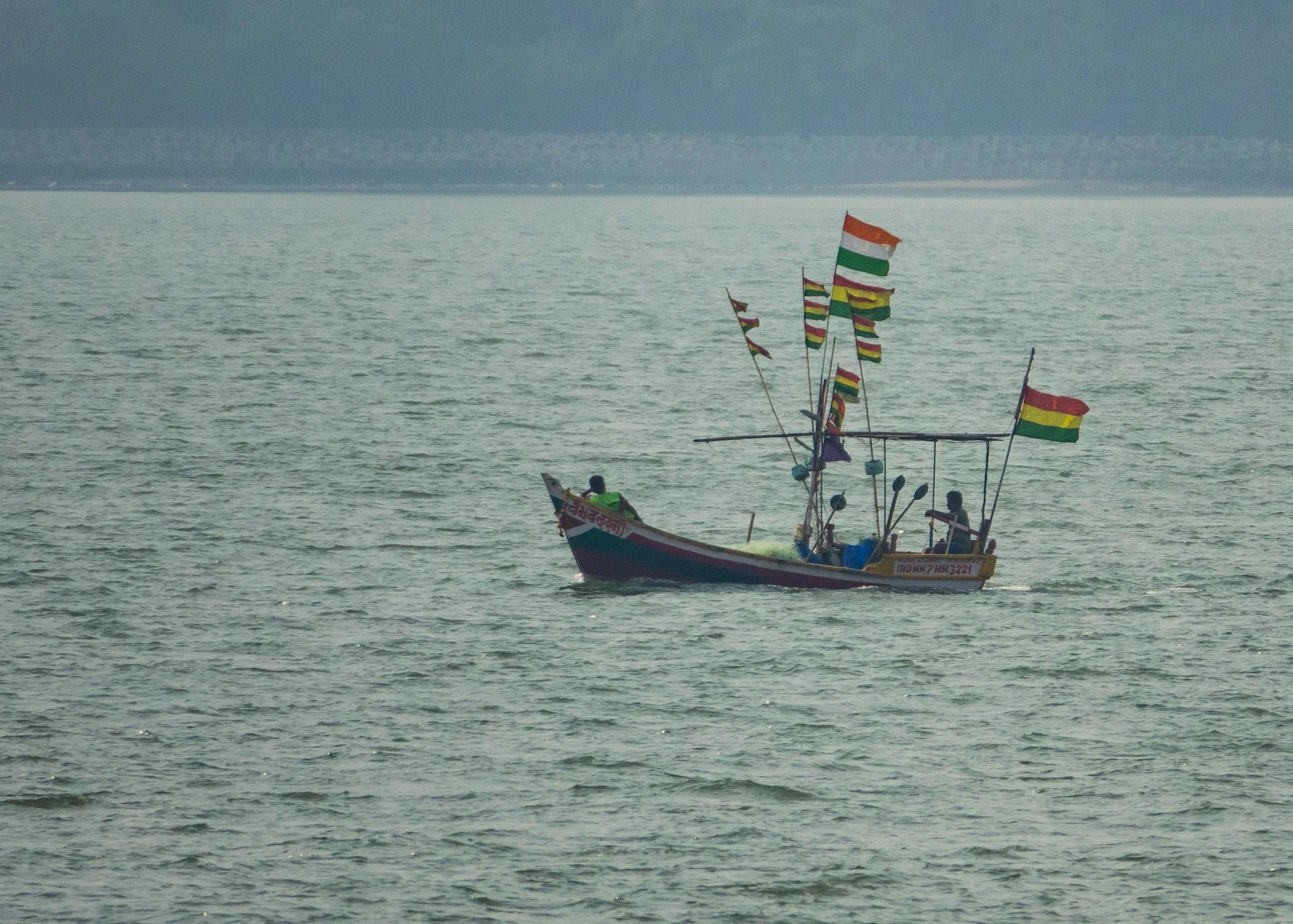  Out on the water there were a lot of colorfully decorated boats. 