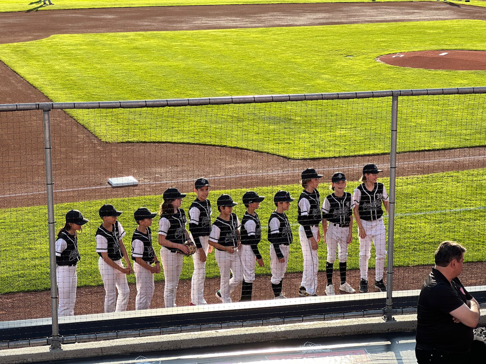  The team on the field before the start of the game - Ethan is on the far right. 