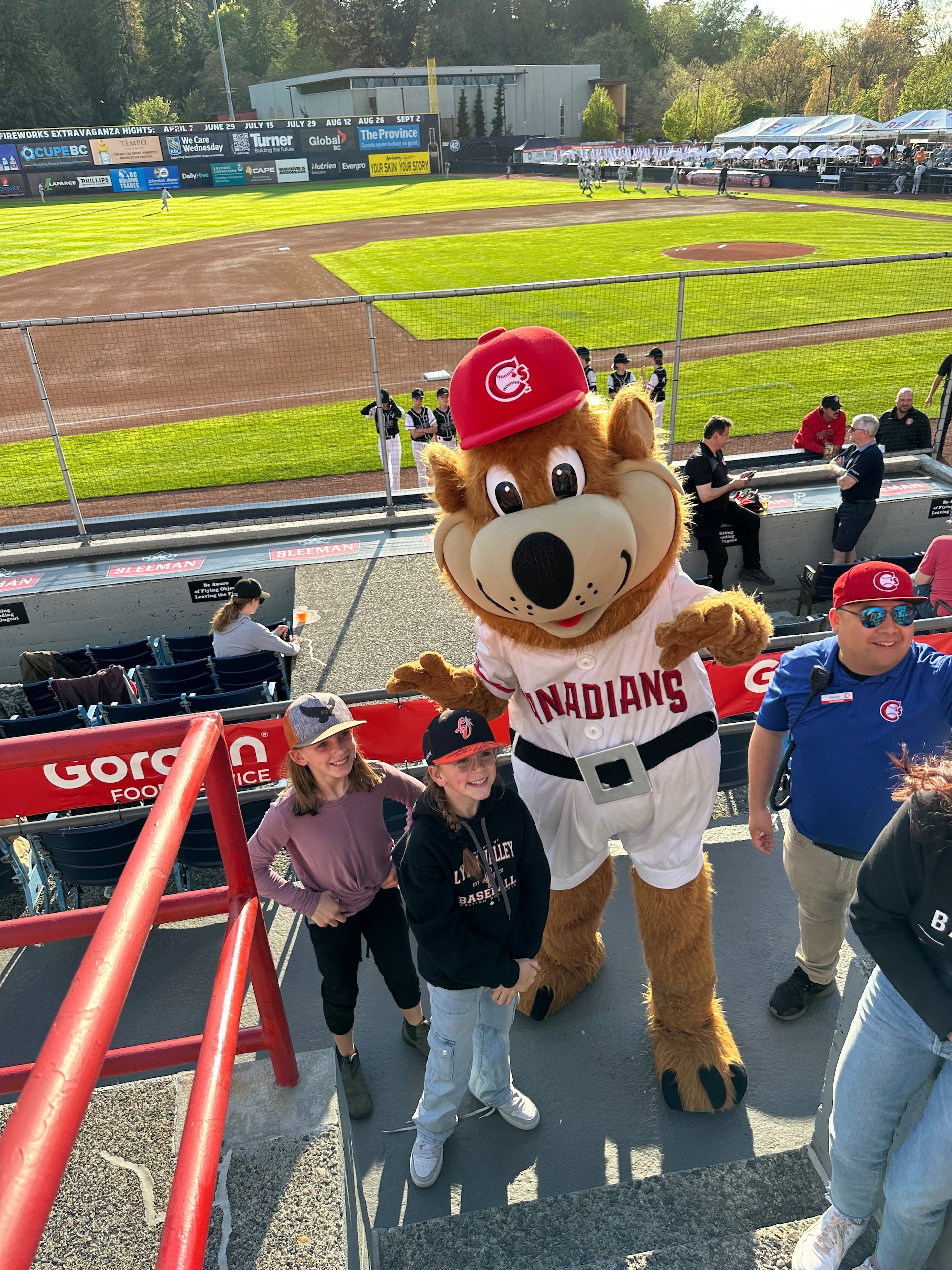  Mascot love! Adi (far left) and her friend hanging out with the mascot.  