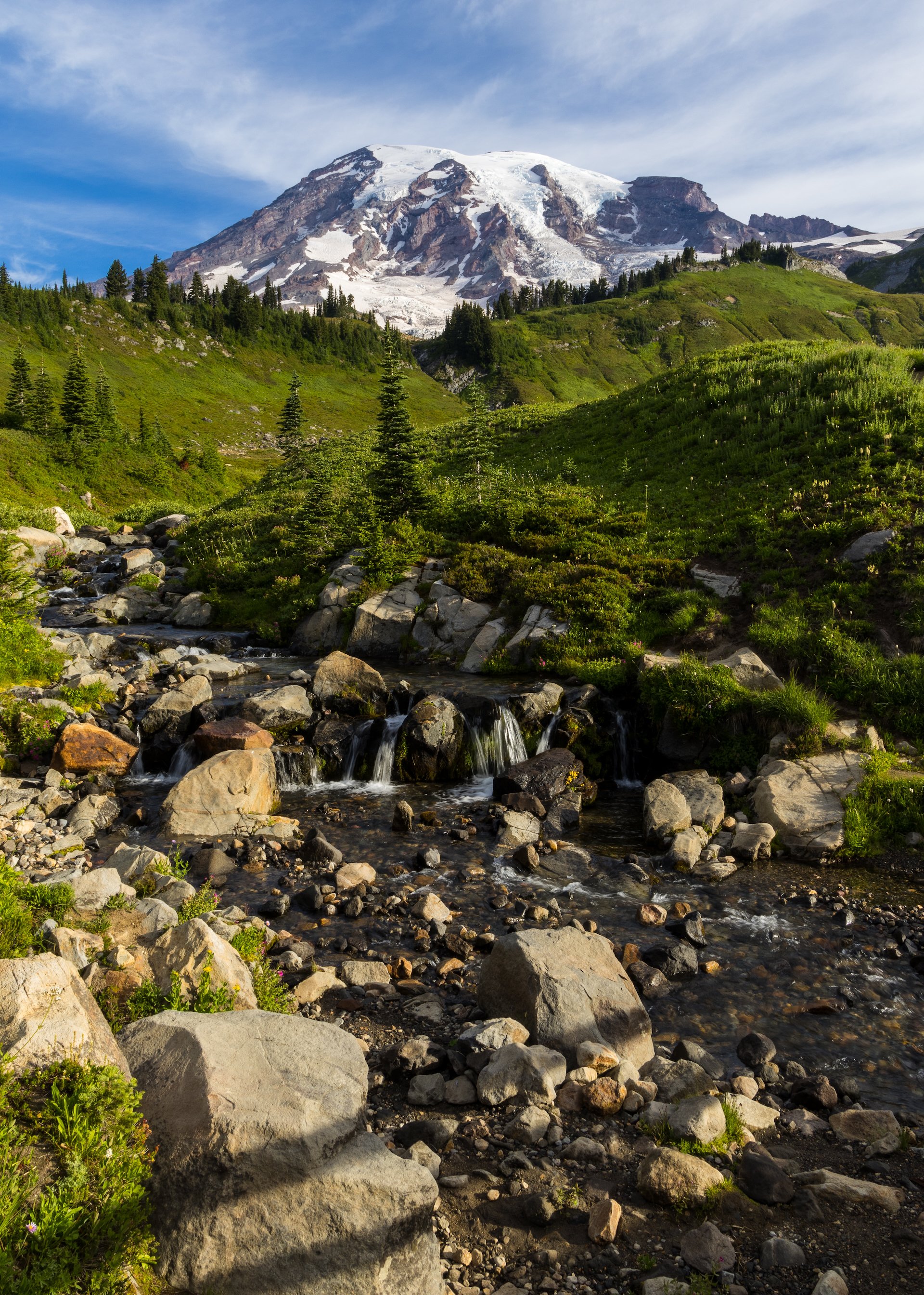  The mountain and the little river, streaming down from the alpine. 