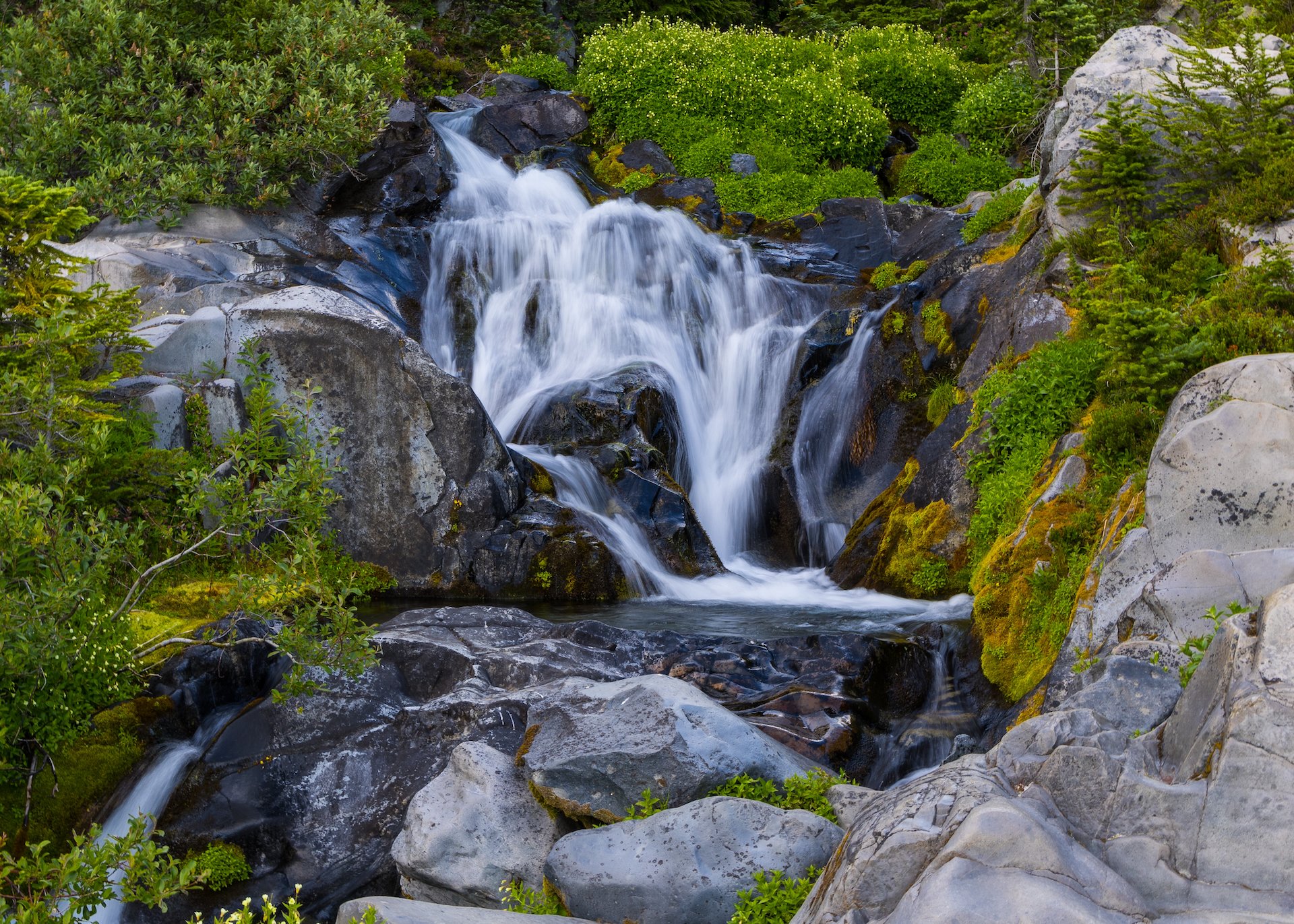  There are many little streams flowing down from the mountain, creating small waterfalls as we continued along the trail.  