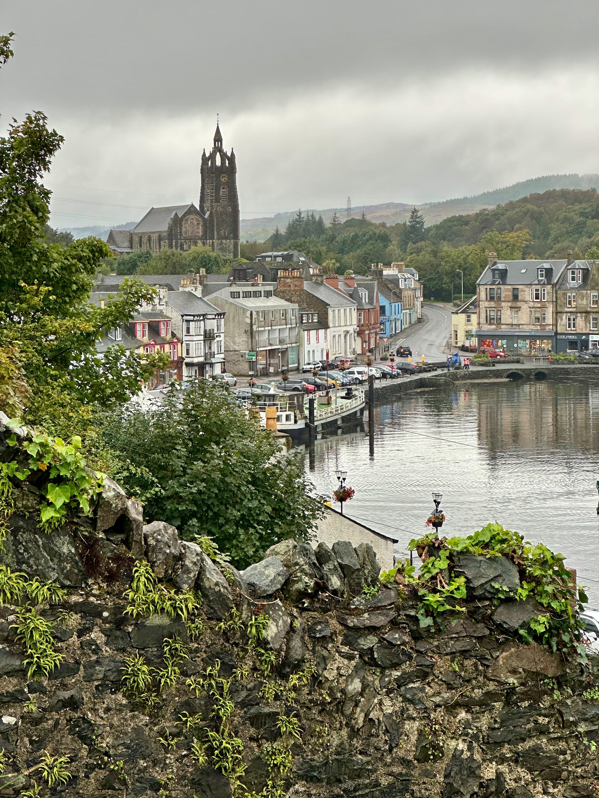  The tiny little fishing village looks out over the harbor and under the watchful eye of the ruins Tarbert Castle.  
