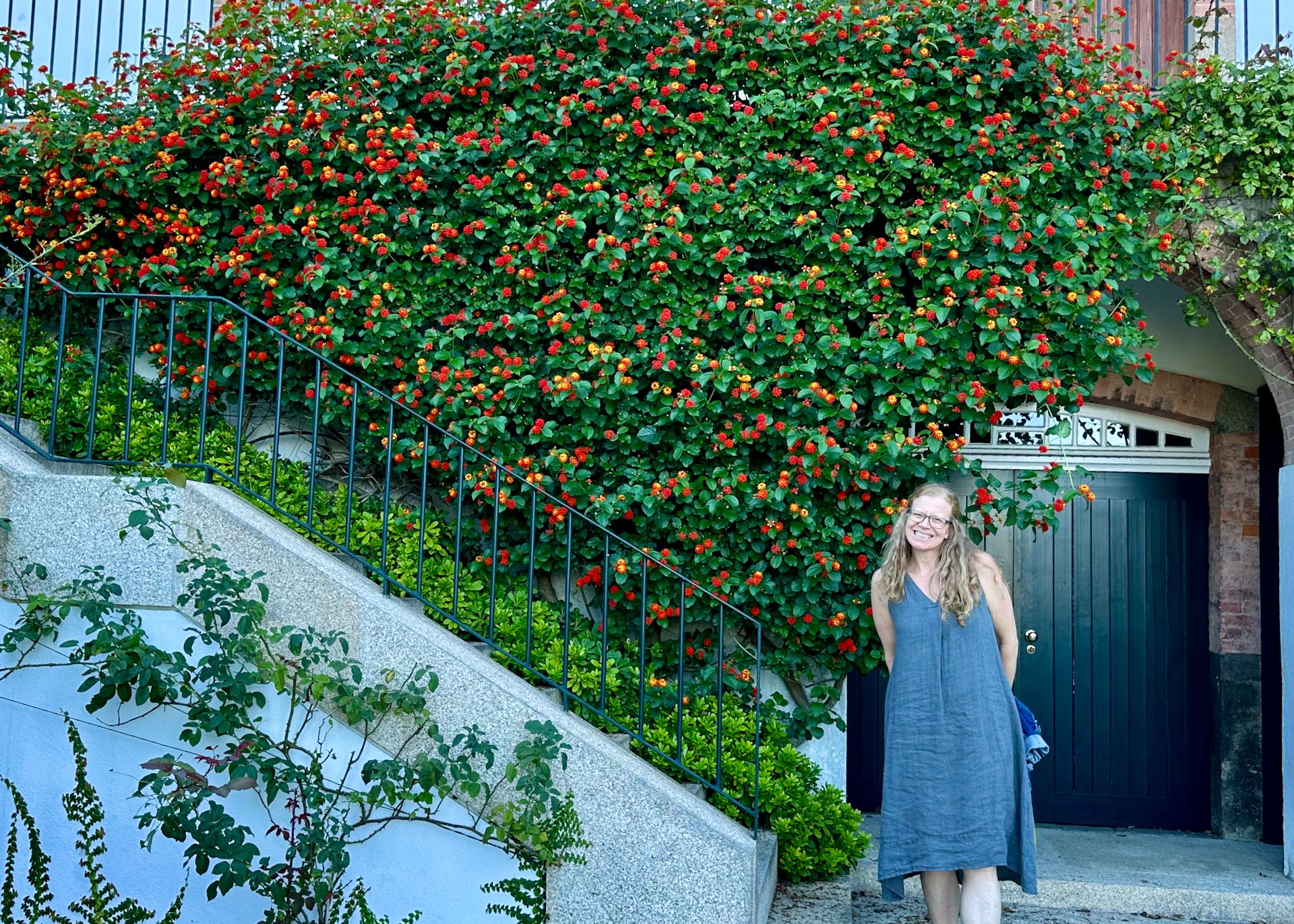  Outside, Justine found a huge bush of her favorite flowers.  