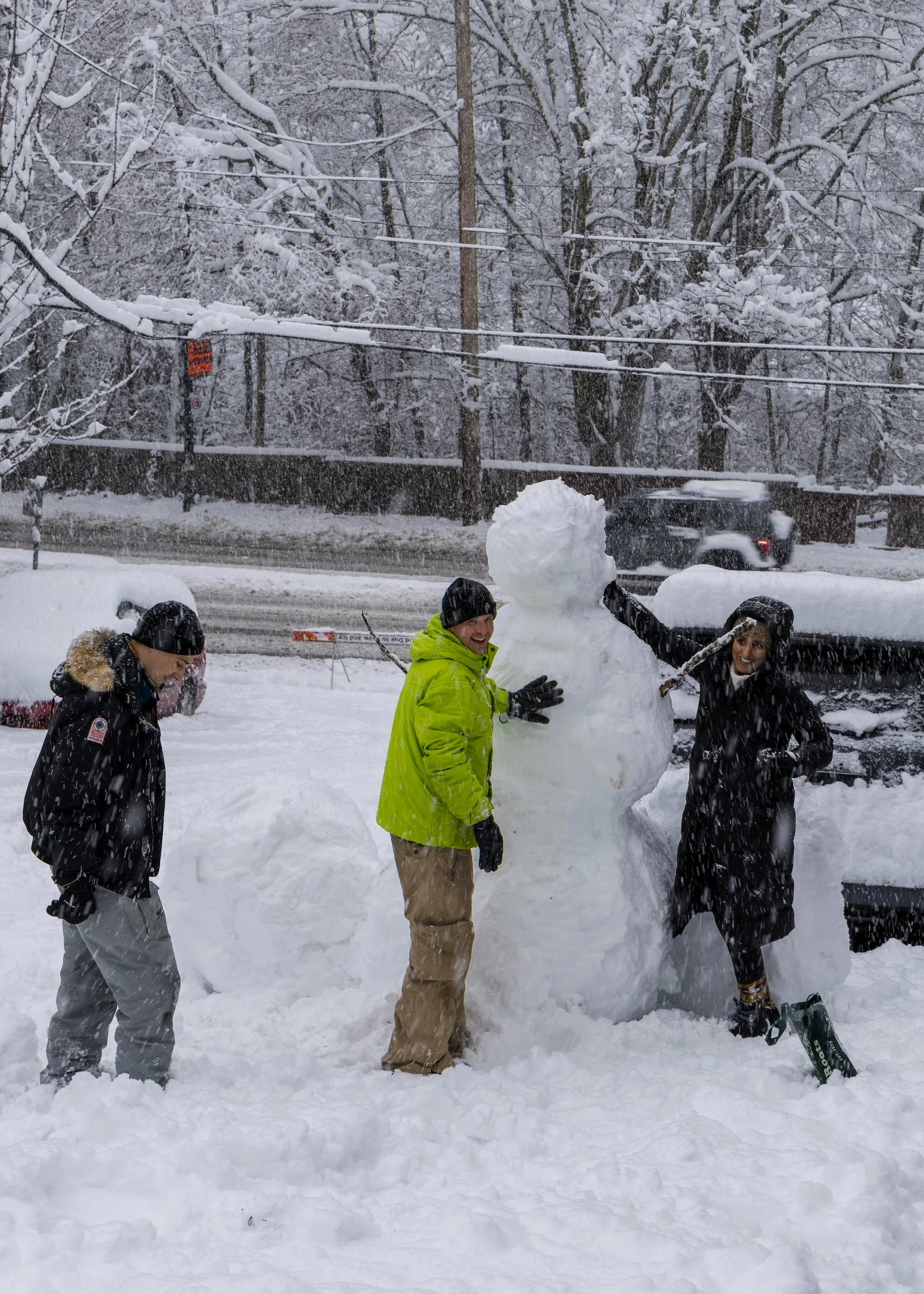  Brin’s Mom and Dad making a huge snowman! 