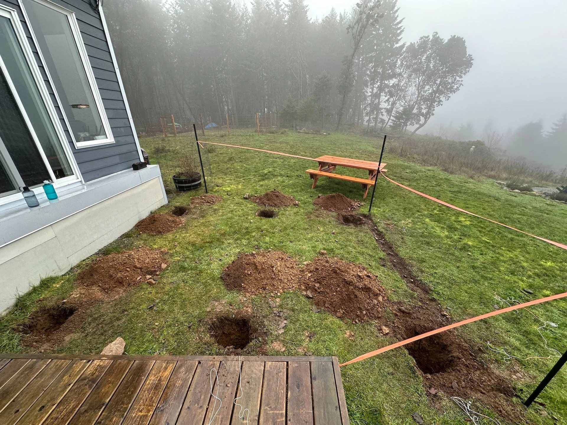  Then it was the slow, painful process of digging out the holes - 2 feet deep into our rocky, sandstone/clay soil is hard labour. But we got there - next trip we’ll bring cement and set the footings.  