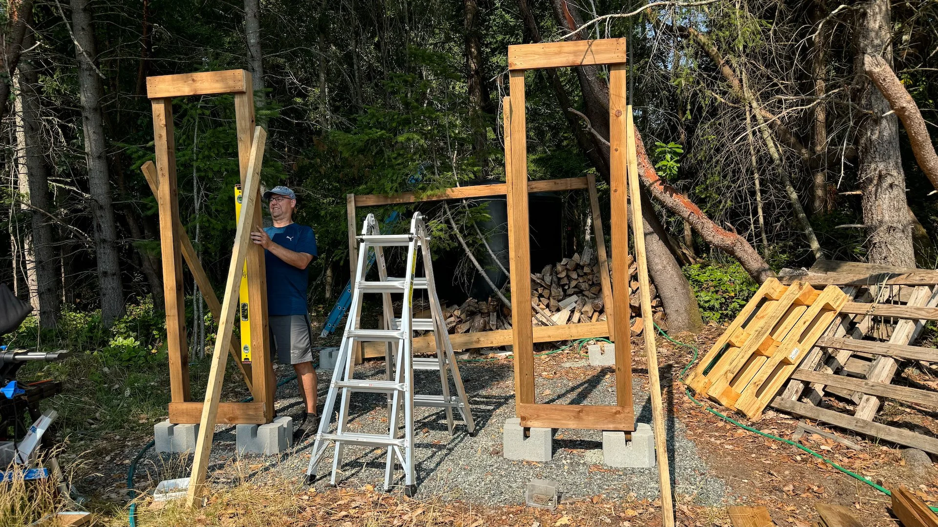  We built a few walls, then propped them up to get everything plumb and (mostly) level. 