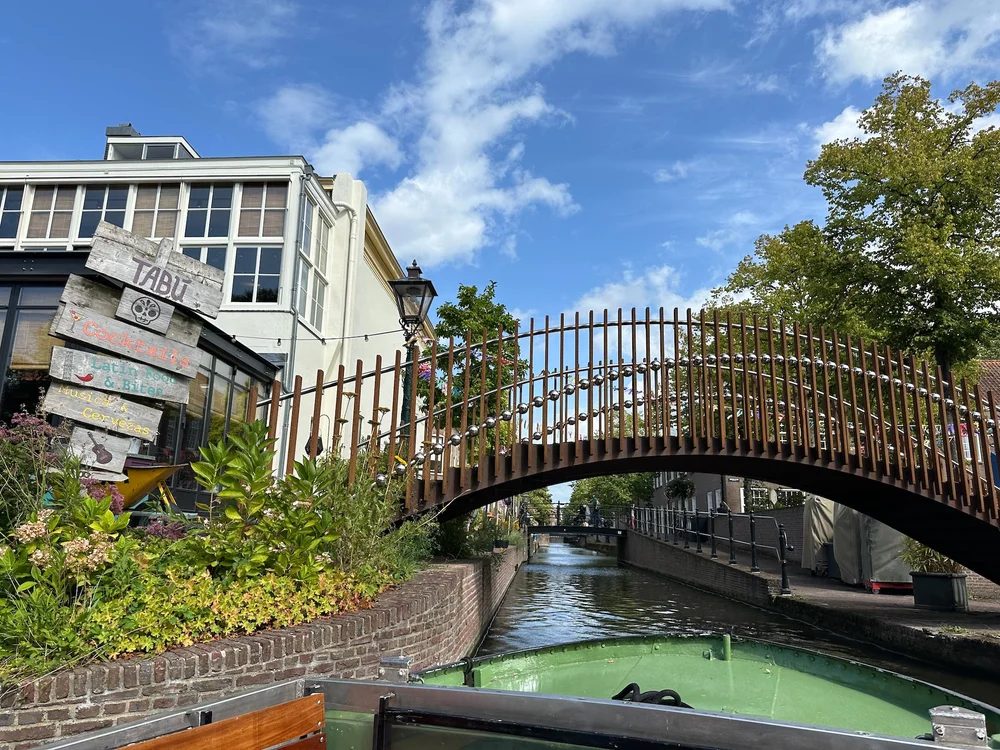  Many of the canals were barely wider than the boat! This was pretty typical, as we went under this great, iron bridge and through the narrow canal.  