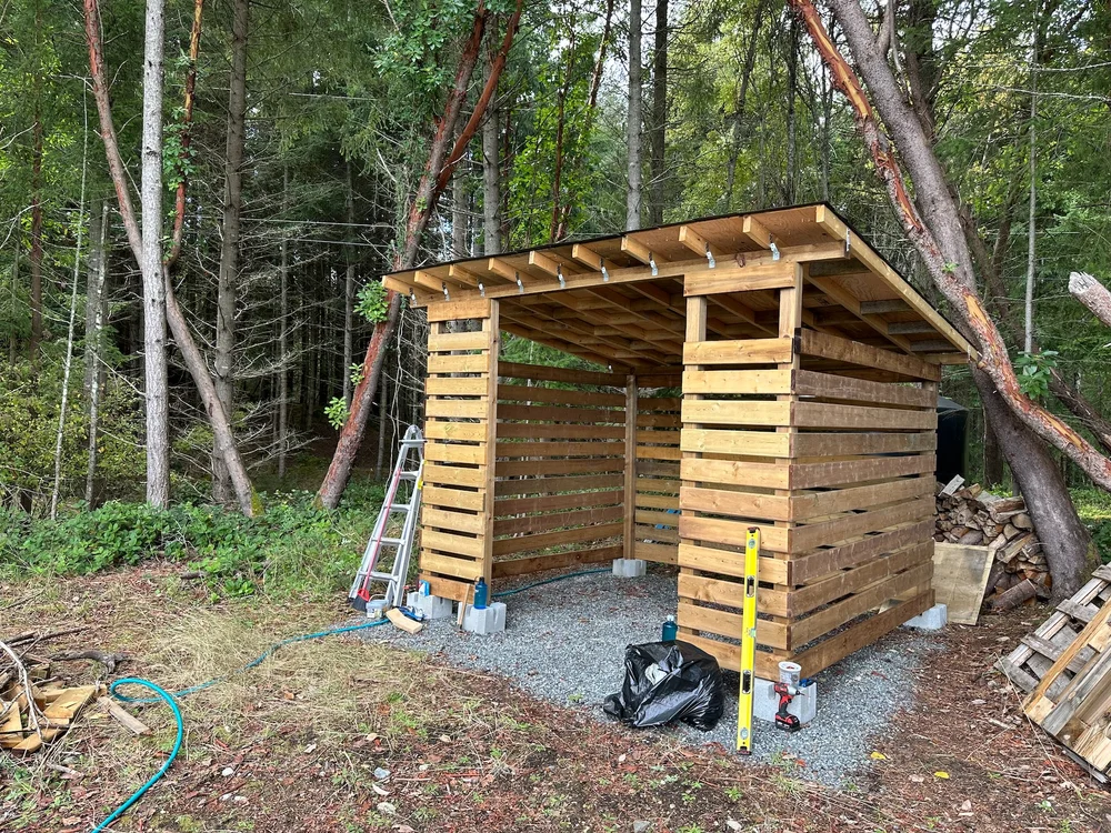  We got the wood shed mostly finished. We still need to sort out what we're doing with a door (if at all) and need a facing board on the front and back. But that's pretty minor. It should serve the need. 