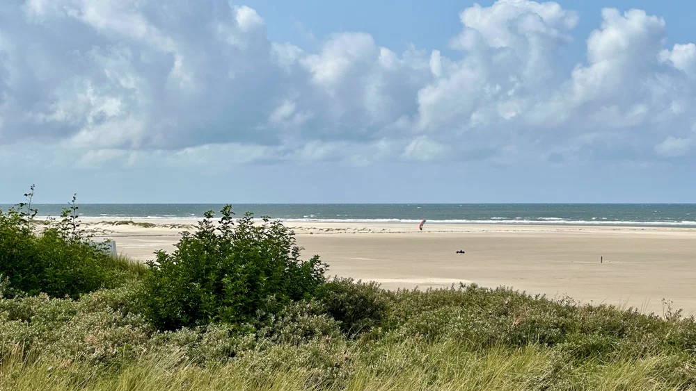  Looking out over the huge beach by the lighthouse. You can just make out a car being pulled by a huge sail. That looks so fun! 