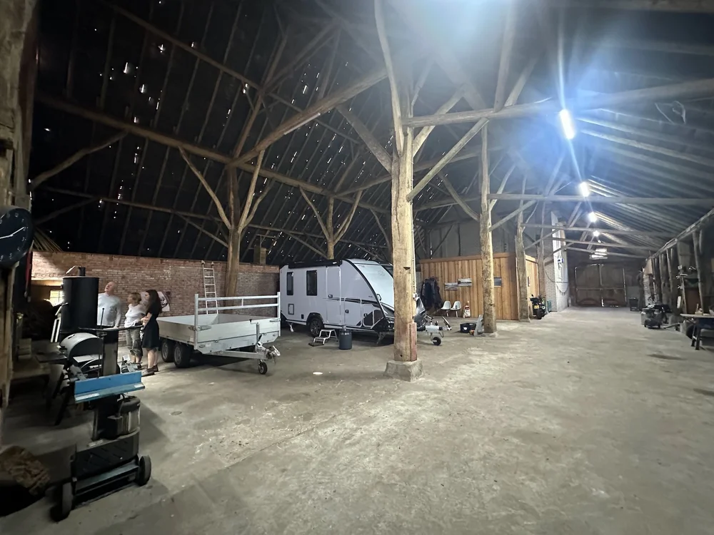  The “barn” part of the house is huge! You can see how far it goes, and there’s even another area where the cows were housed, off beyond the brick wall.  