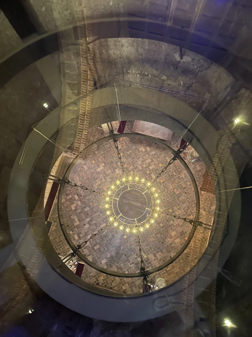  You could look down through the floor to the rooms below.  