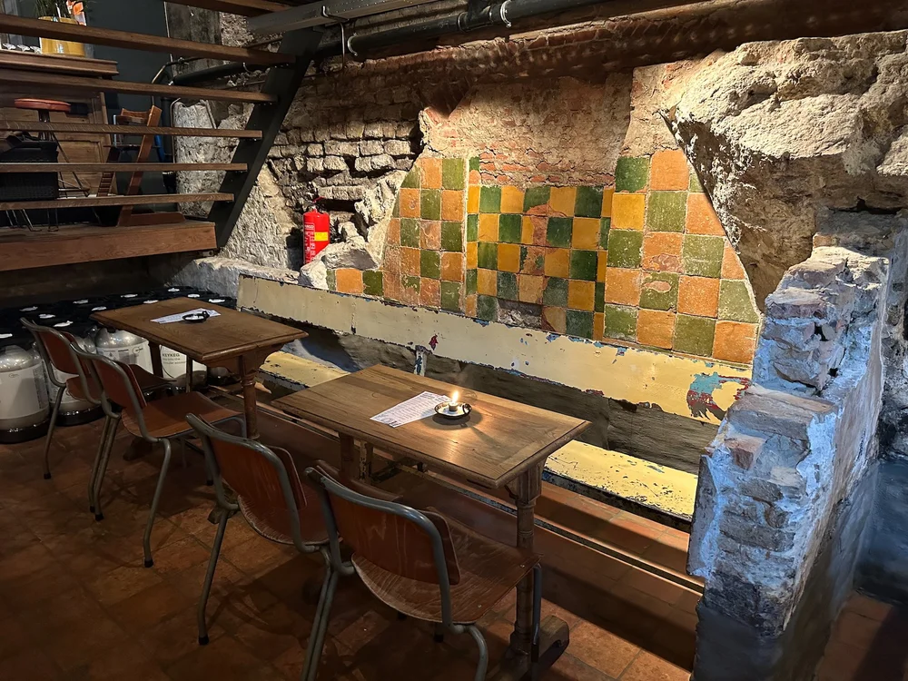  According to the waitress, they think these tiles date back to the founding of the city. The green and yellow are apparently quite unique.  