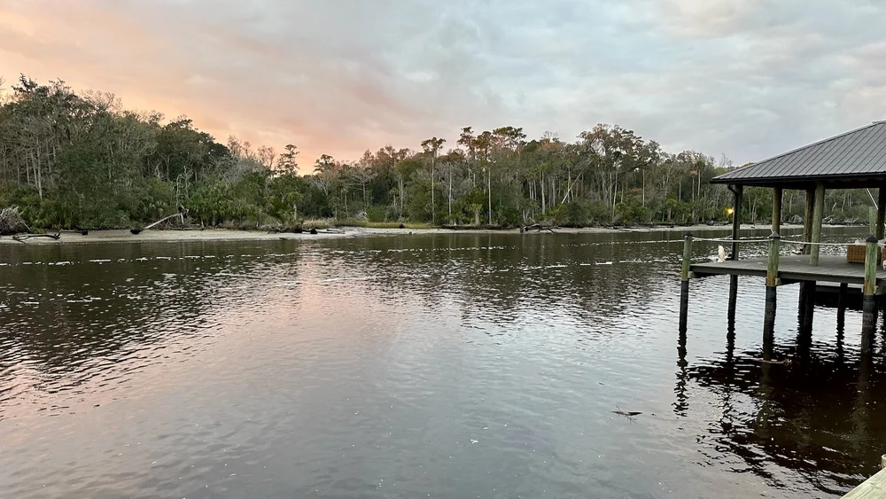  It was later afternoon as we arrived in the outskirts of Jacksonville. Dan took me to one of his favorite spots, a bar/restaurant along the Intracoastal Waterway. It was happy hour, so we had a drink and some oysters, and enjoyed the sun setting on 