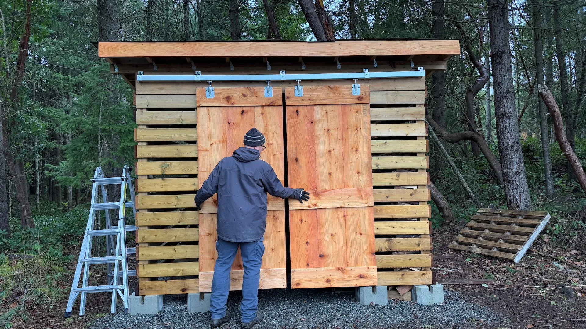 We finished up the doors and the last bit of hardware to keep them closed.