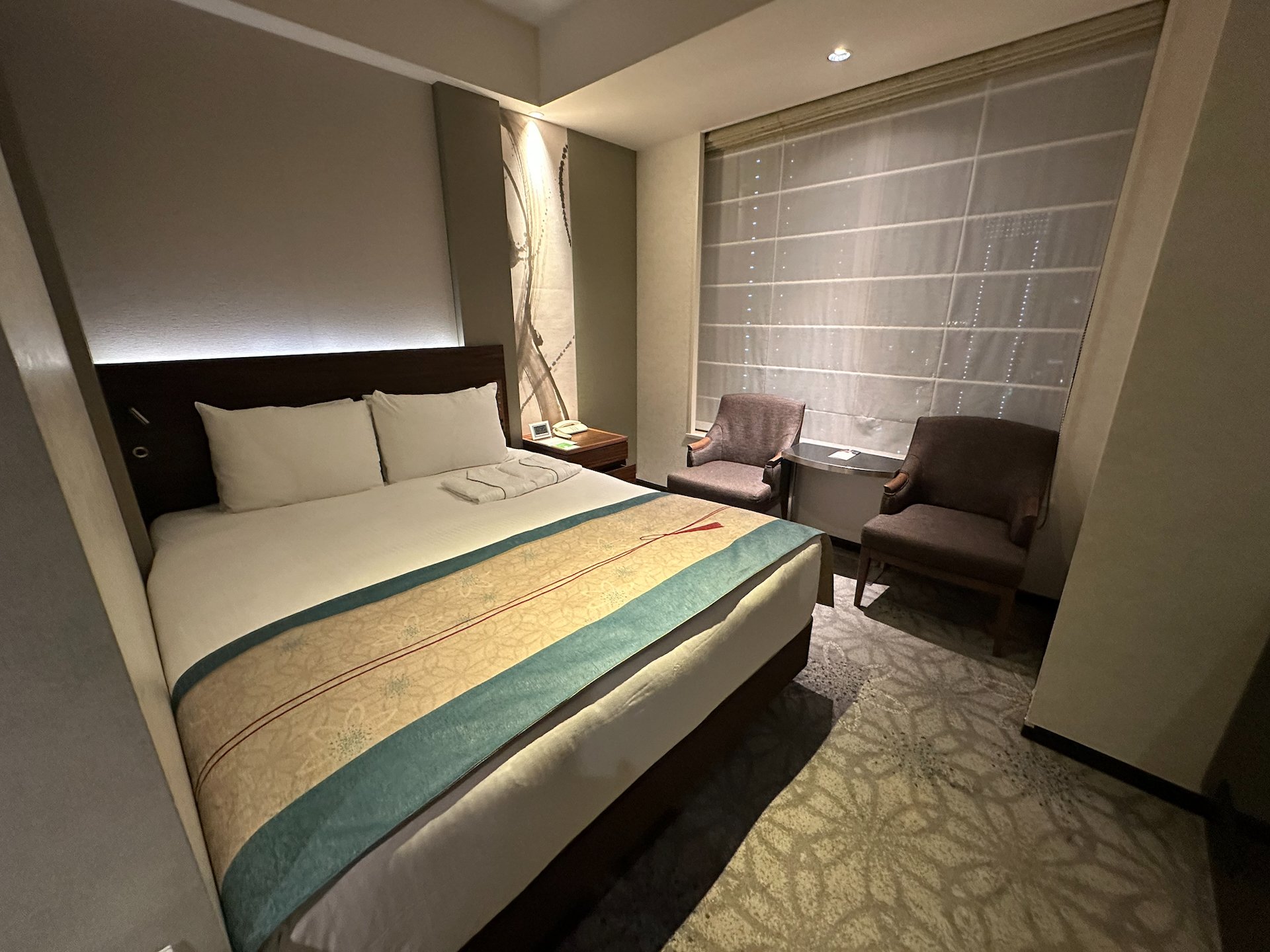  The room was a bit tight, but it was nicely appointed and the bed was comfortable.  