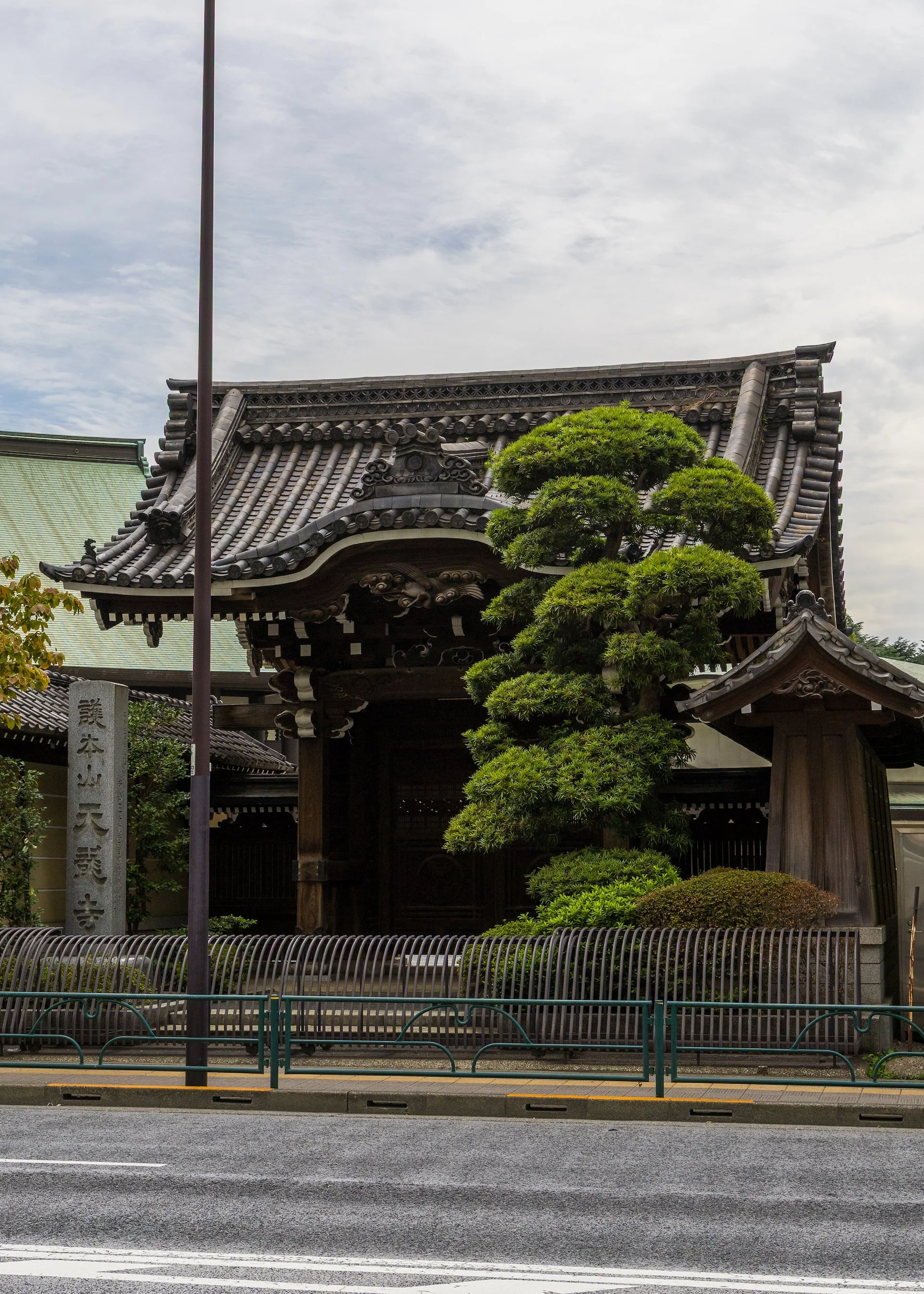  This pretty little shrine was just stuck between random buildings on a busy street.  