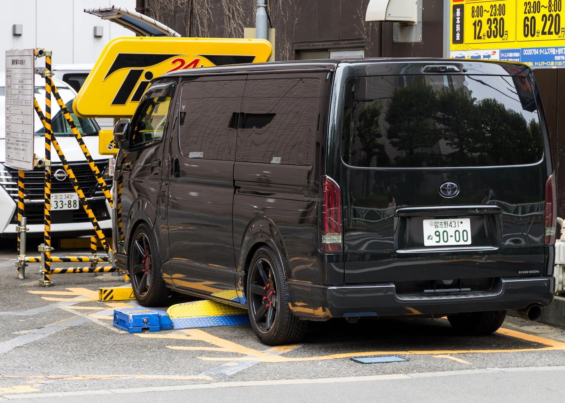  When you park, this big metal plate goes up against the bottom of your vehicle. It only goes down once you pay!  