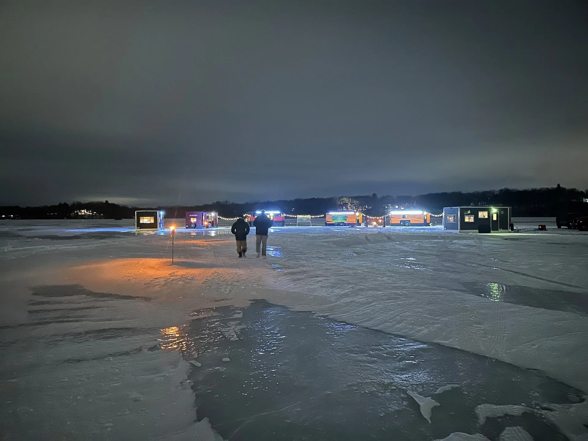  Heading out to the ice fishing “huts”. 