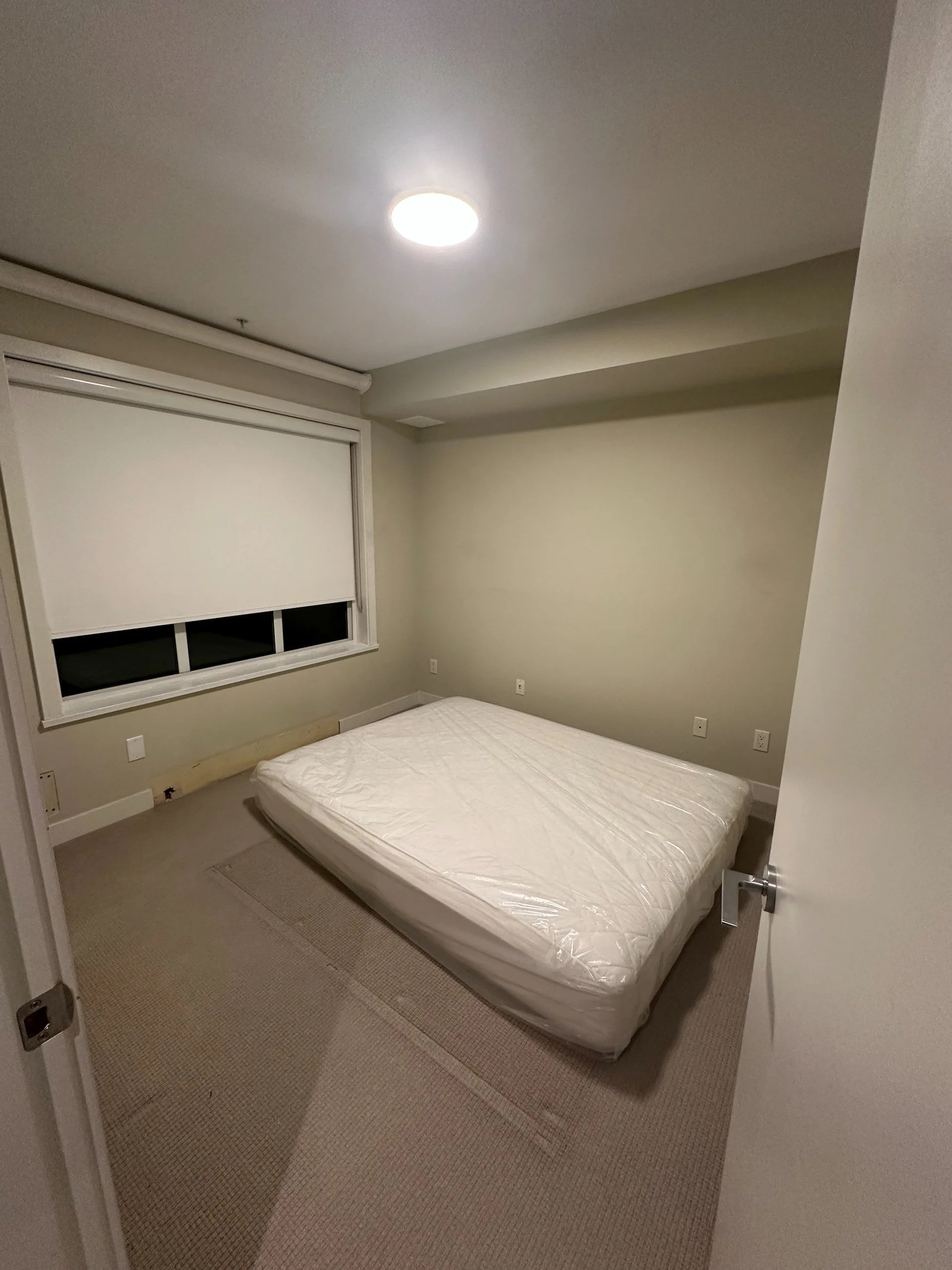  The guest bedroom. There was a lot of damage from the heat pump installation.  