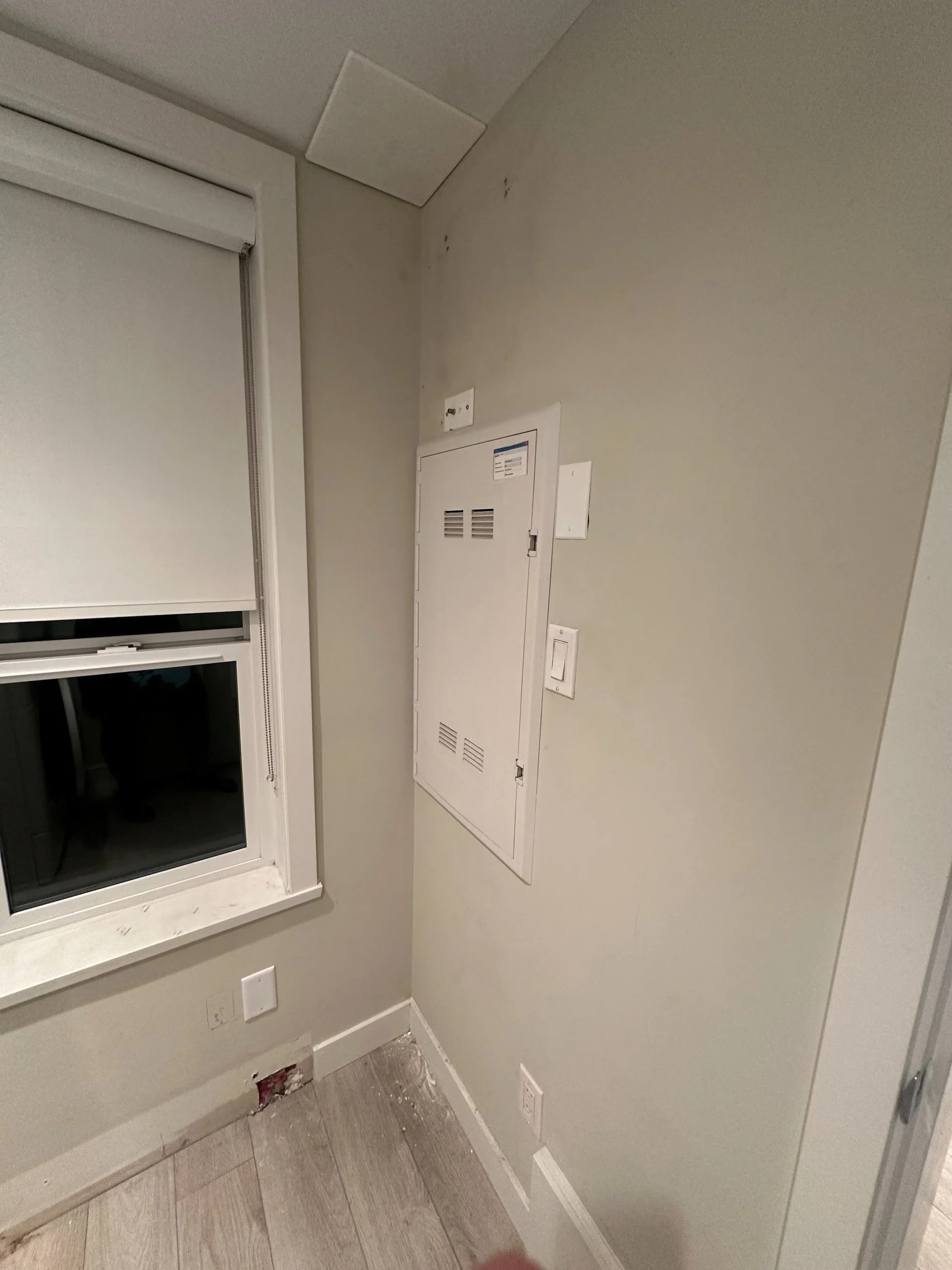  Laundry room. You could see parts cut out of the baseboards where the heaters had been removed.  