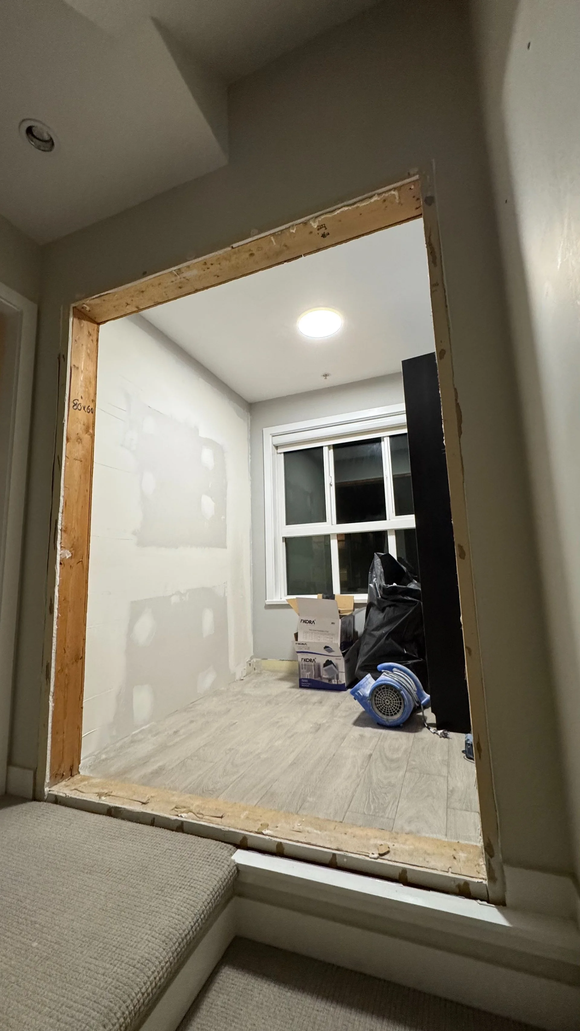  The new wall is all done and the drywall patched. 