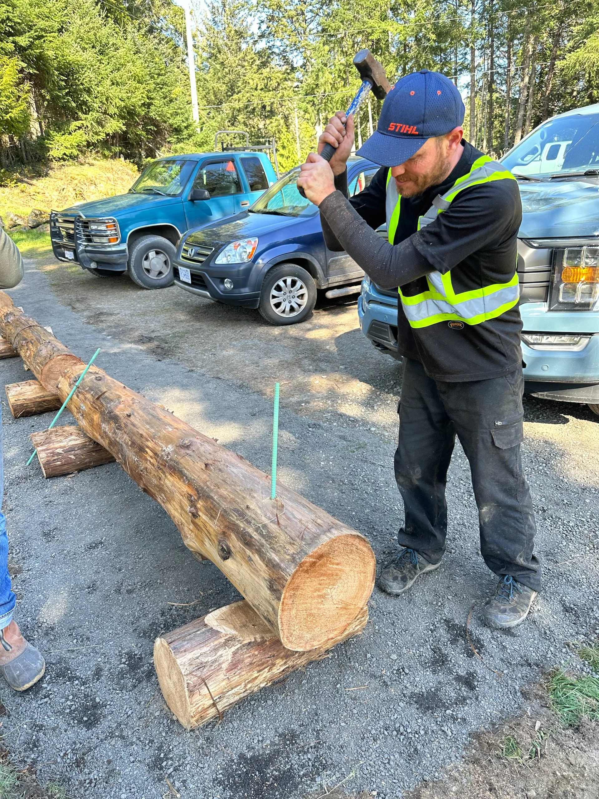  After creating risers for the big logs to get them off the ground, we tested driving rebar through them and into the ground.  