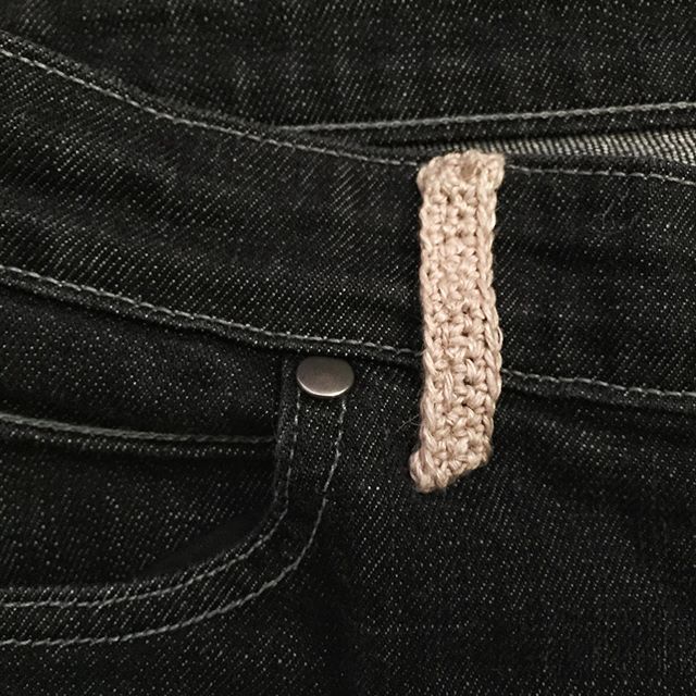 Today in #visiblemending, I crocheted and sewed on a new belt loop. Bought these jeans secondhand and didn&rsquo;t realize the belt loop was missing until I was trying to clip my keys to a loop that didn&rsquo;t exist.
.
Yarn is @hempforknitting allh