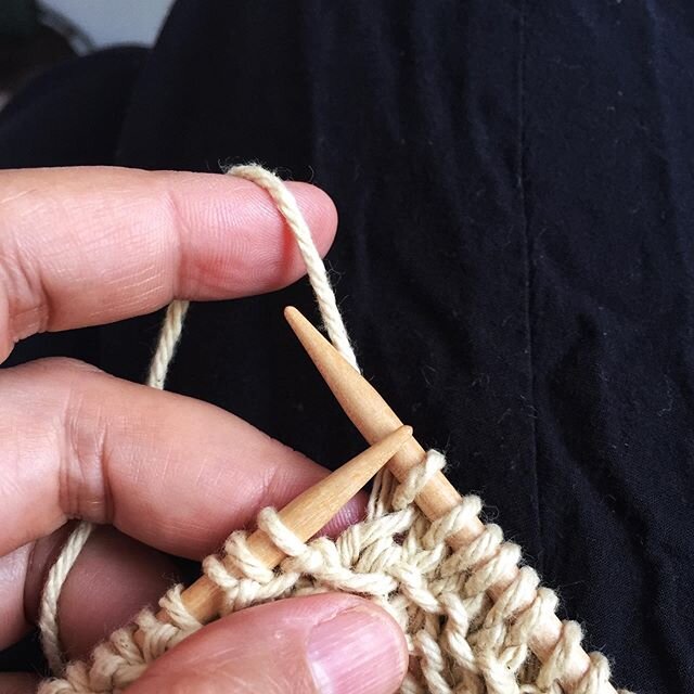 Knitting a washcloth - Purl Soho Close Knit Washcloth pattern (just far enough from garter stitch to keep me engaged) with a random unlabeled skein of cotton yarn from my stash. Looks like it may have been a dye experiment.