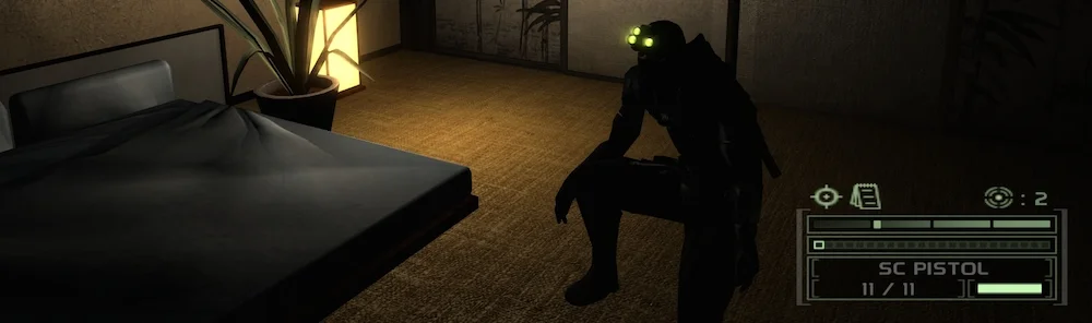 Tom Clancy’s Splinter Cell: Chaos Theory (2006). All that matters for Fisher’s visibility is the gauge on the screen. The three bright lights on his head are neither here nor there.