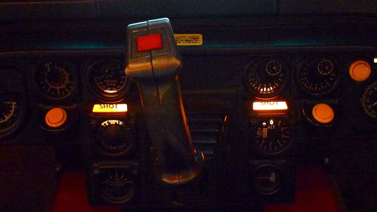 The joystick. I’m sticking with the family-friendly description, “80s-style”.