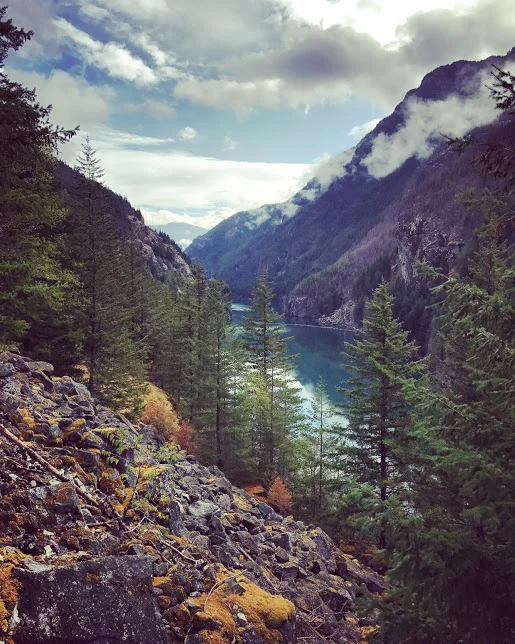 mountains with blue water below from north cascades.JPG