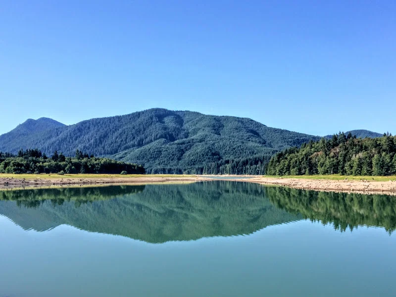 blue hills reflection in lake water.JPG