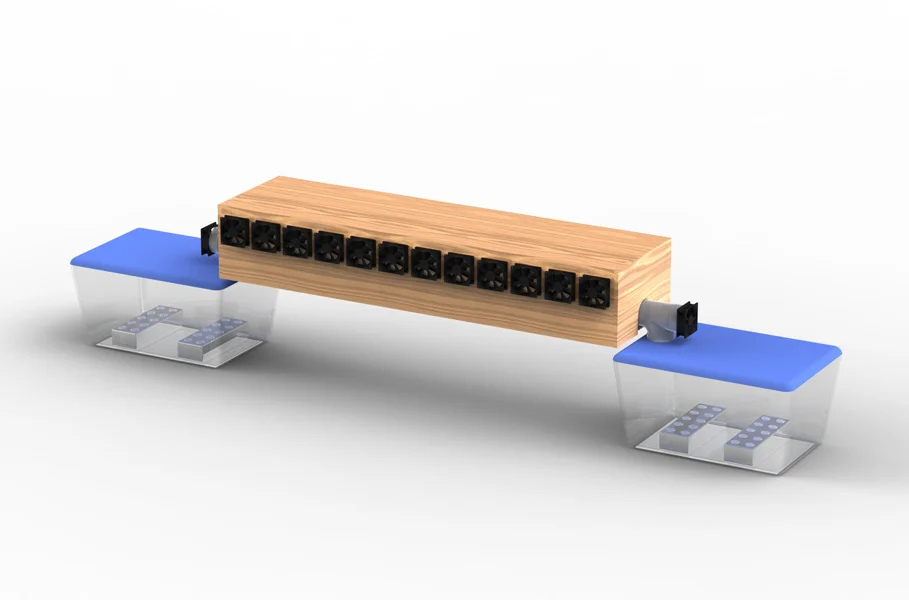  Fog is generated in containers on either end of the screen and piped out between the banks of fans. 