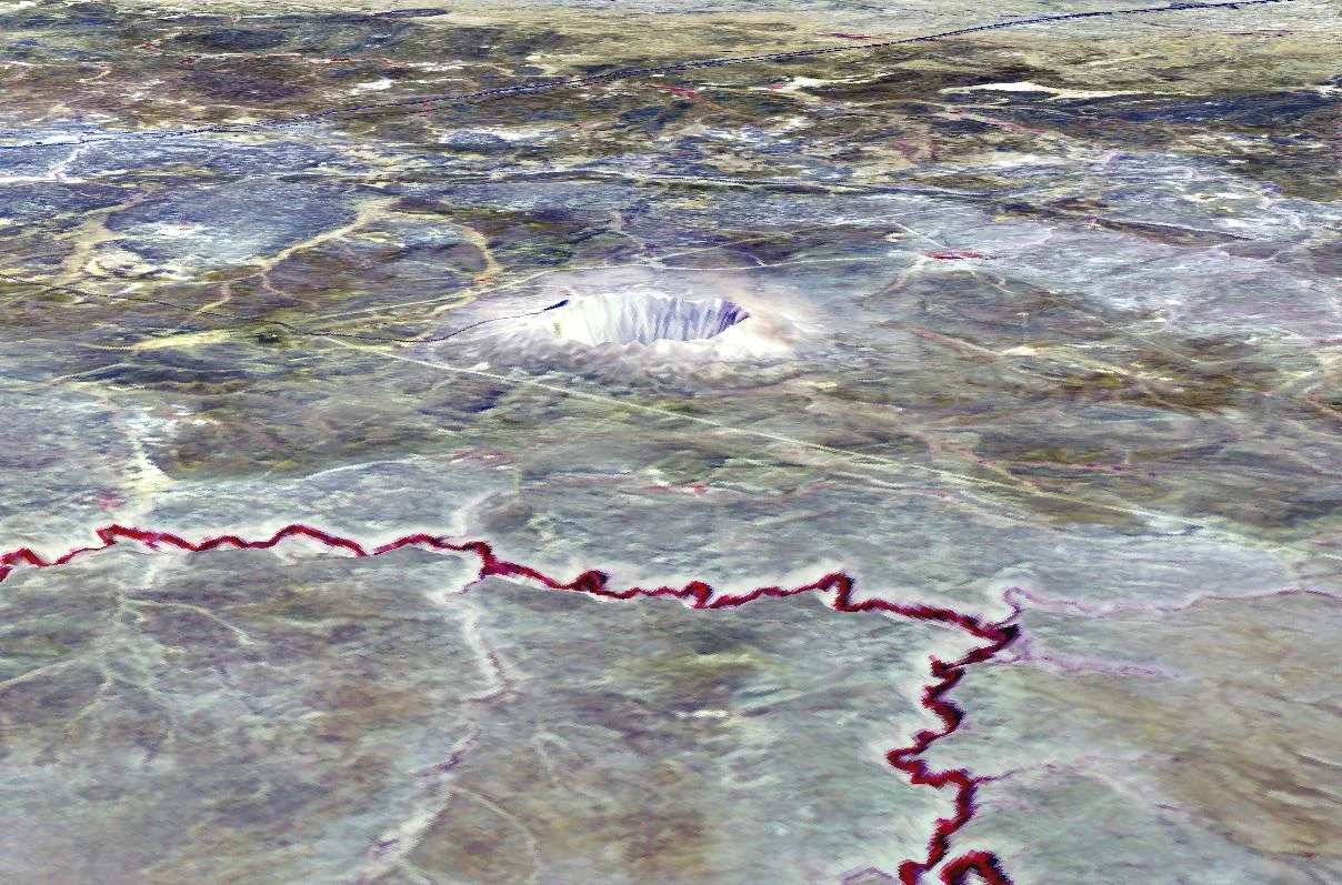 This image of Arizona's Barringer Meteorite Crater, the result of a 10 megaton impact, overlays imaging data from the Terra spacecraft on USGS elevation data. Image Credit: Nasa/GSFC/Meti/Ersdac/Jaros, and U.S./Japan Aster Science Team